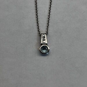 Stirling Silver Pendant Necklace With Light Blue Crystal